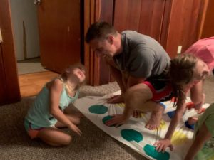 Family plays twister