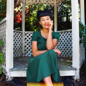 Author sits in a gazebo